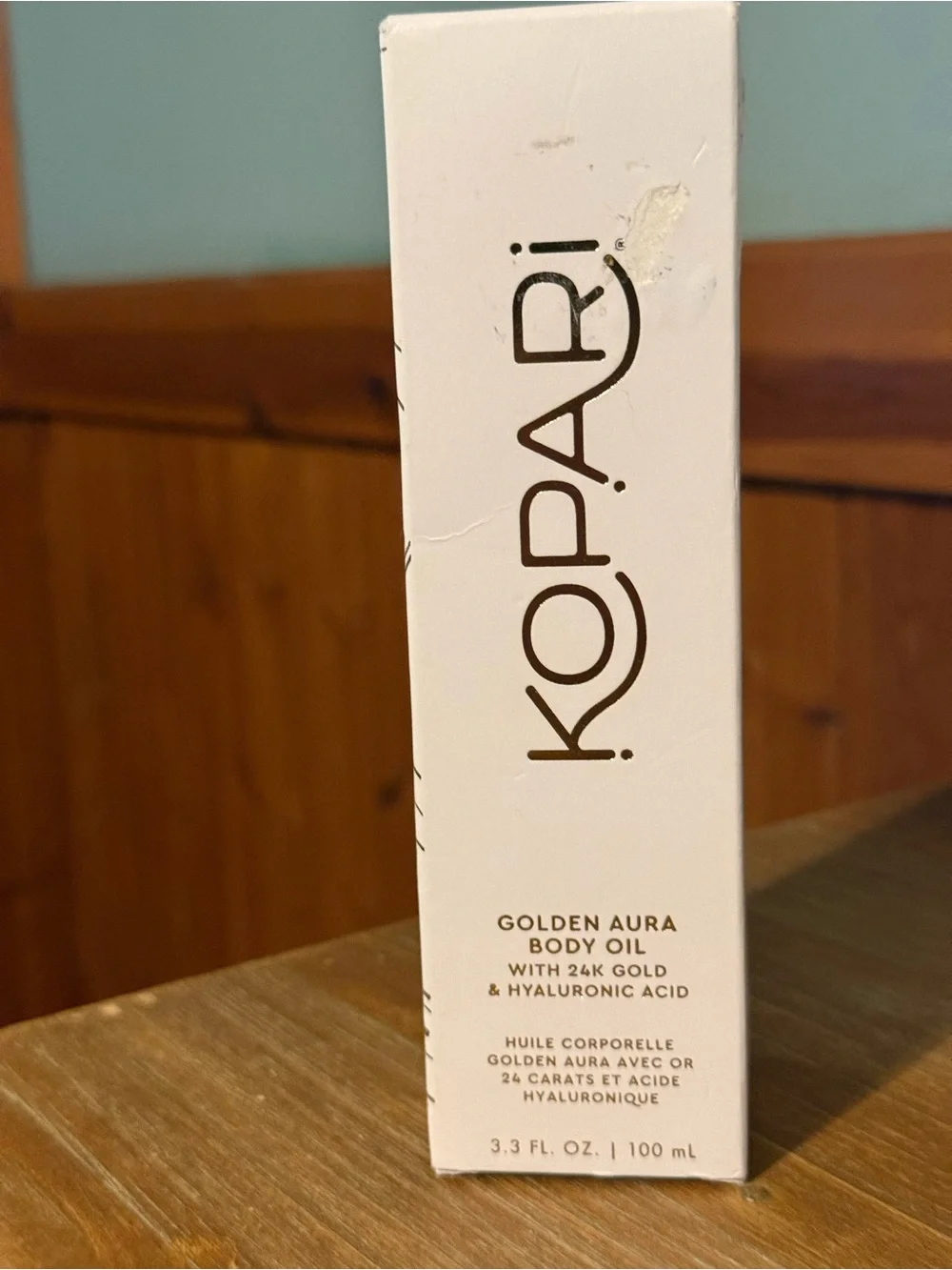 Kopari Golden Body Oil - Clear Bottle with Gold Oil and White Pump